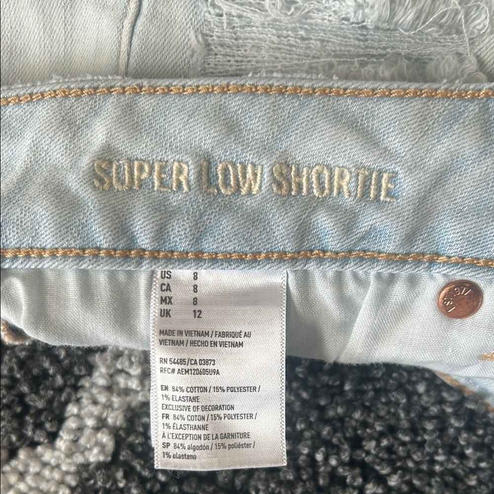 American Eagle Super Low Shortie Distressed Light Blue Denim Shorts Size 8 - Picture 4 of 4